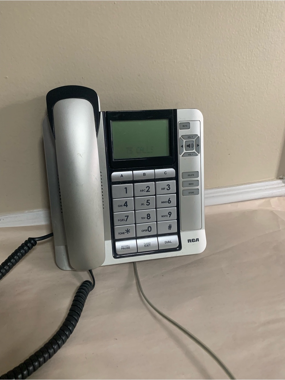 Silver and Black Corded Desk Phone with LCD